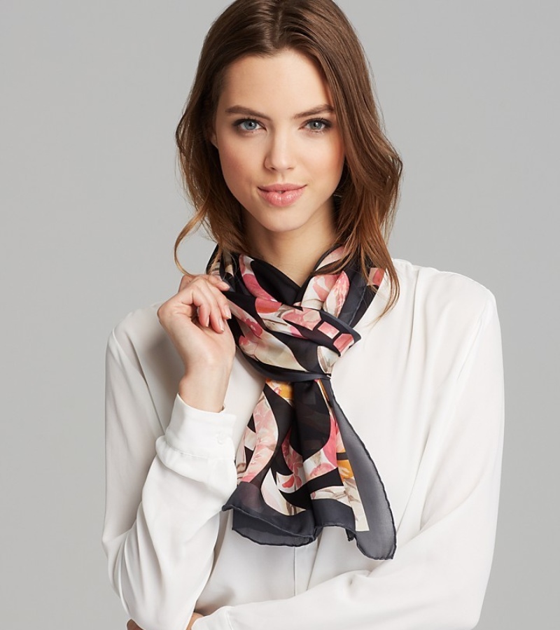 Ferragamo’s silk pieces showcase Italian artistry. Scarves and ties add subtle luxury to everyday wardrobes. / Photo Ferragamo