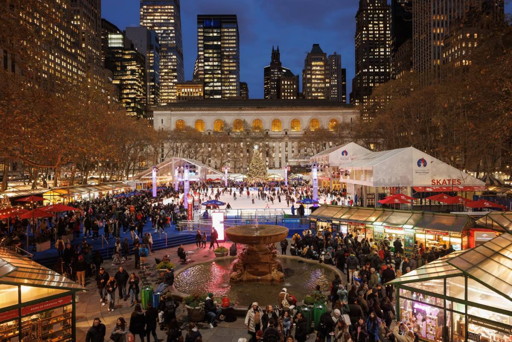 Bryant Park’s Winter Village opens in late October and extends into January. It features artisan booths, seasonal treats, and a popular ice rink / Photo Bryant Park’s Winter Village