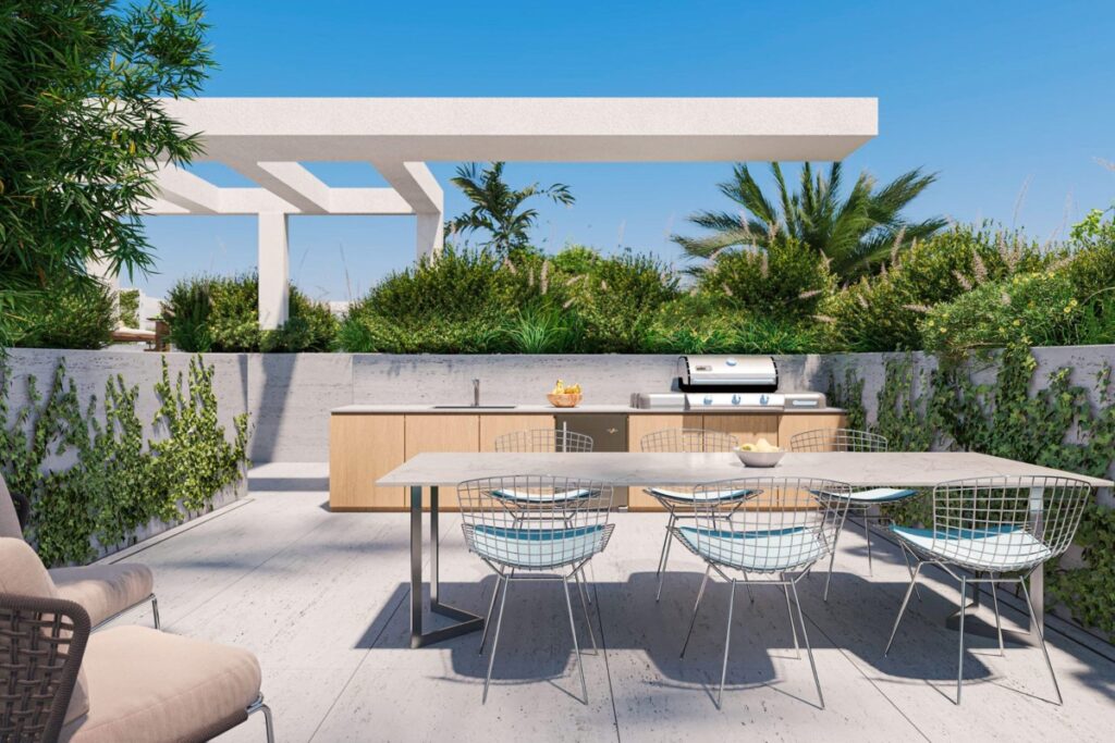 Outdoor spaces extend living areas toward the water / Photo 9900 West