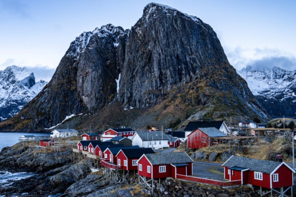 Rising sharply from Norway’s Arctic waters, Lofoten feels almost surreal. Jagged peaks meet icy seas, creating dramatic contrasts / Photo visitnorway
